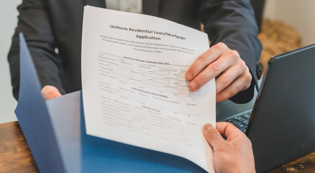 Illustration of a calculator and financial documents representing debt service coverage ratio calculation